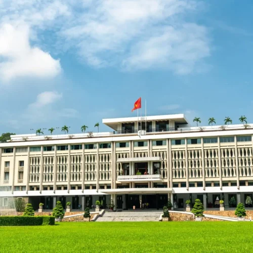 Front view of the Independence Palace (Reunification Palace) in Ho Chi Minh City, a key historical landmark featured in Ho Chi Minh City tours.