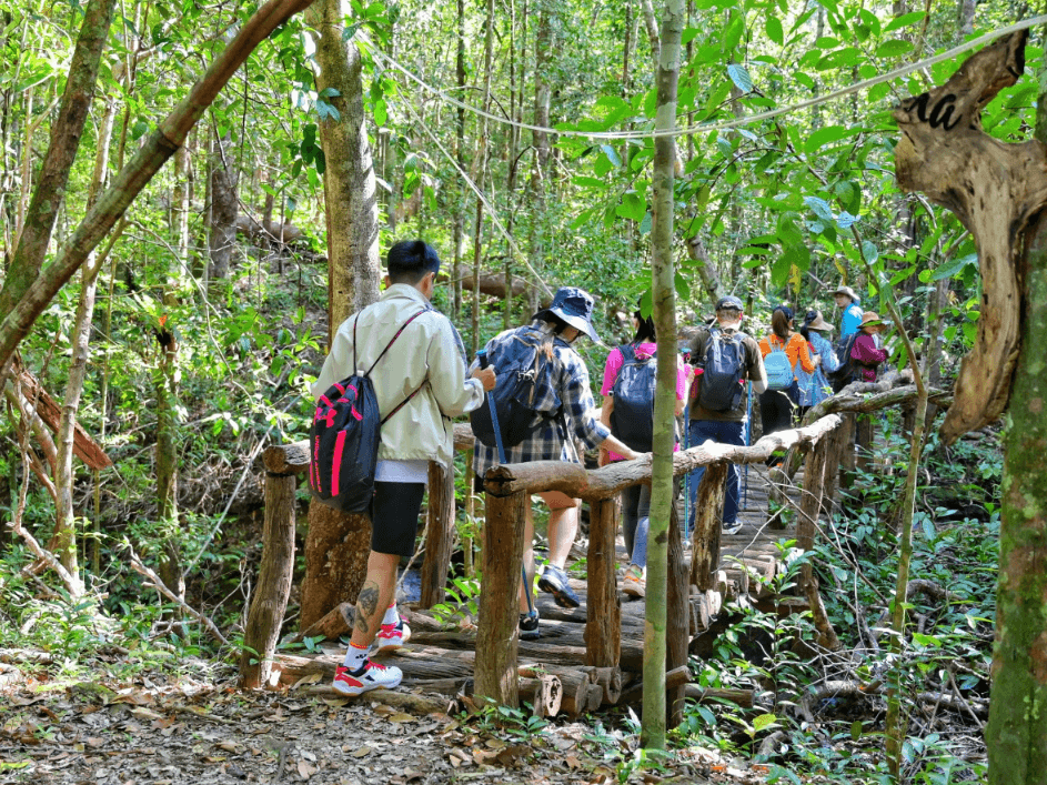 Group of tourists trekking in Phu Quoc National Park