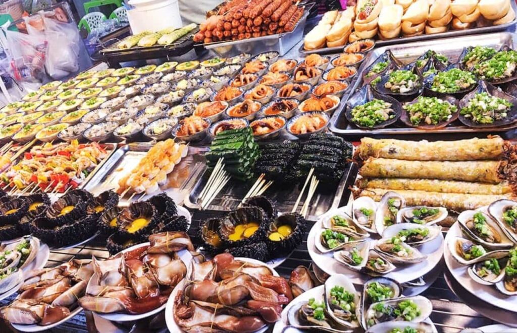 A variety of different seafood are displayed on the table.